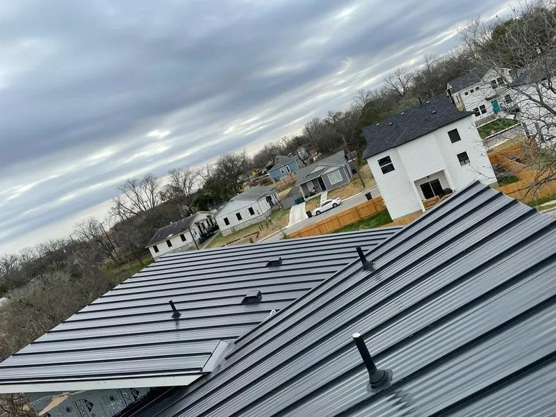 Standing seam metal roof panels with vents for Skylight Repair in Forsyth